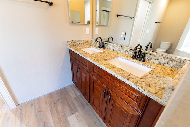 45 Pecan Course Loop, Ocala, FL 34472 - bathroom with double vanity and wood finished floors