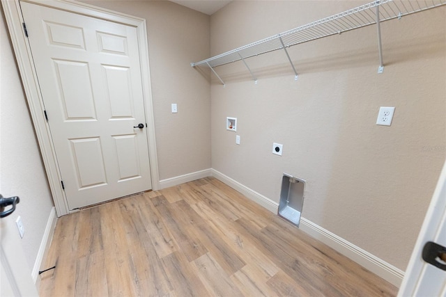 45 Pecan Course Loop, Ocala, FL 34472 - washroom featuring hookup for a washing machine, light wood-type flooring, and electric dryer hookup