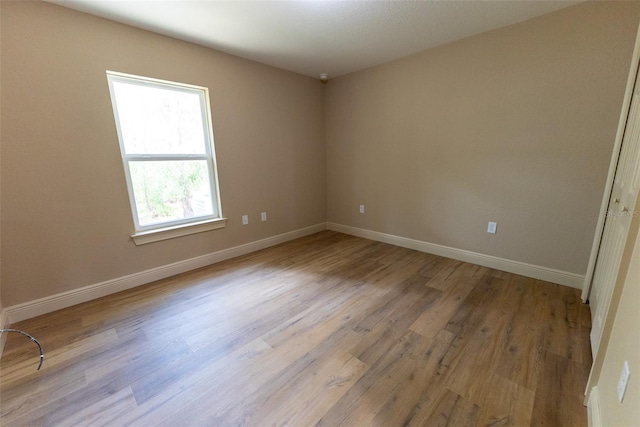 45 Pecan Course Loop, Ocala, FL 34472 - empty room featuring baseboards and wood finished floors