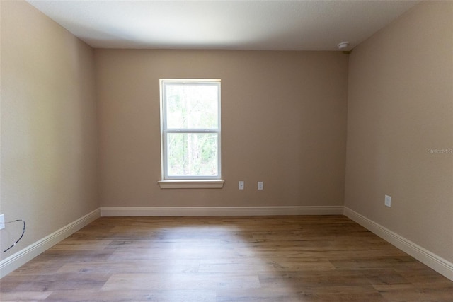 45 Pecan Course Loop, Ocala, FL 34472 - spare room featuring wood finished floors and a smoke detector