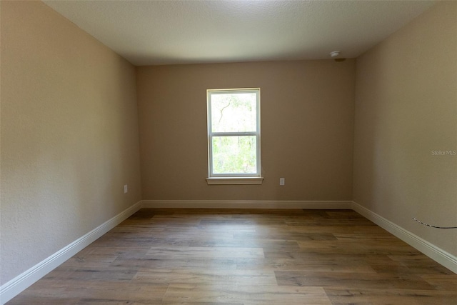 45 Pecan Course Loop, Ocala, FL 34472 - spare room with wood finished floors and baseboards