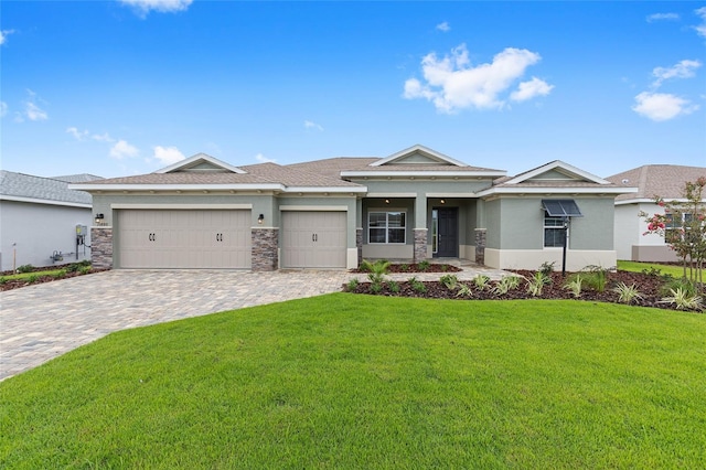 10880 SW 101st Loop, Ocala, FL 34481 - view of front of property featuring stucco siding, a garage, a front lawn, decorative driveway, and stone siding