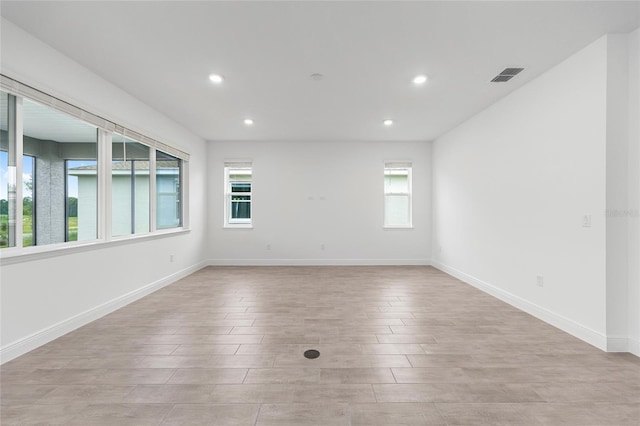 10880 SW 101st Loop, Ocala, FL 34481 - unfurnished room featuring light wood-style flooring and recessed lighting