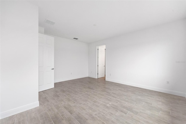 10880 SW 101st Loop, Ocala, FL 34481 - empty room with light wood-style flooring