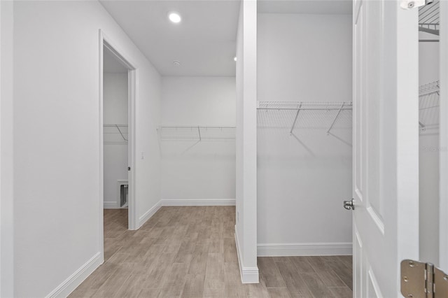 10880 SW 101st Loop, Ocala, FL 34481 - spacious closet with wood finished floors