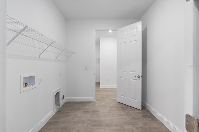 10880 SW 101st Loop, Ocala, FL 34481 - washroom featuring hookup for a washing machine, wood finished floors, and hookup for an electric dryer