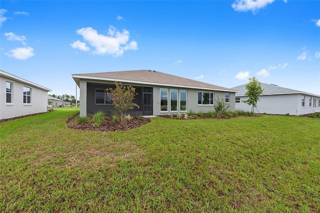 10880 SW 101st Loop, Ocala, FL 34481 - back of property featuring a yard and stucco siding