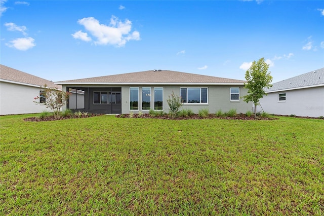 10880 SW 101st Loop, Ocala, FL 34481 - back of house featuring a lawn, a sunroom, and stucco siding