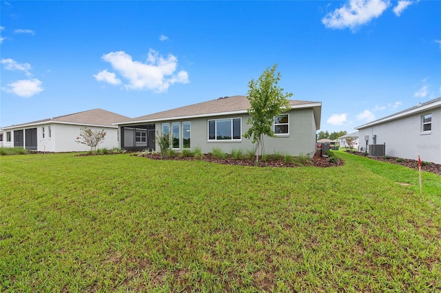10880 SW 101st Loop, Ocala, FL 34481 - view of front facade with a front yard and stucco siding