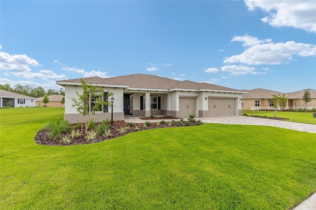 10833 SW 101st Loop, Ocala, FL 34481 - view of front of property with a garage, stucco siding, and a front lawn