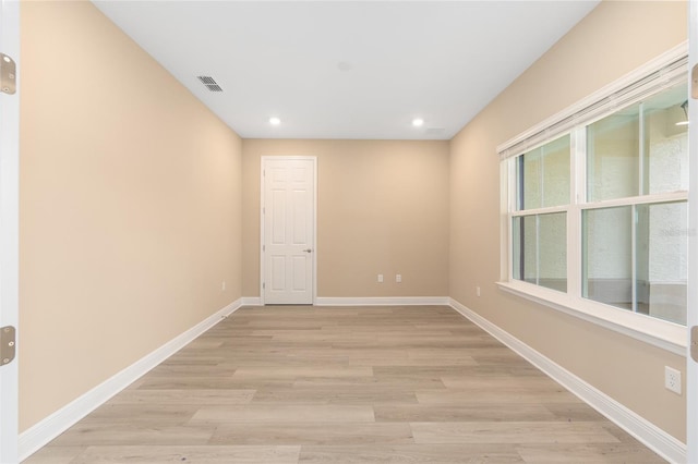 10833 SW 101st Loop, Ocala, FL 34481 - spare room featuring light wood-type flooring and recessed lighting
