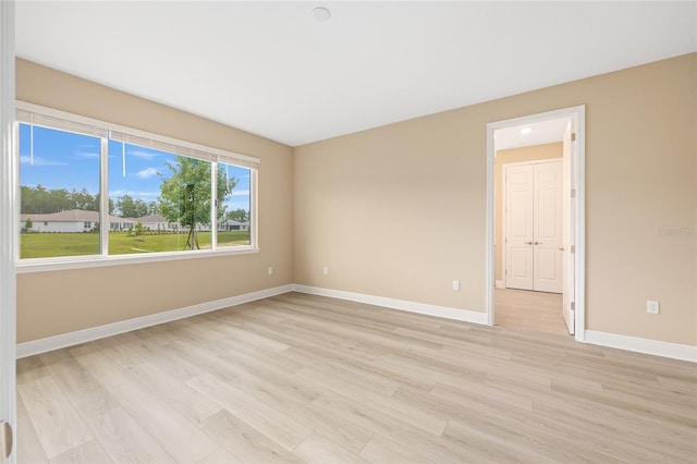 10833 SW 101st Loop, Ocala, FL 34481 - empty room featuring light wood-type flooring and baseboards