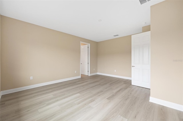 10833 SW 101st Loop, Ocala, FL 34481 - empty room featuring light wood-style flooring and baseboards