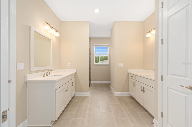 10833 SW 101st Loop, Ocala, FL 34481 - bathroom with two vanities and baseboards
