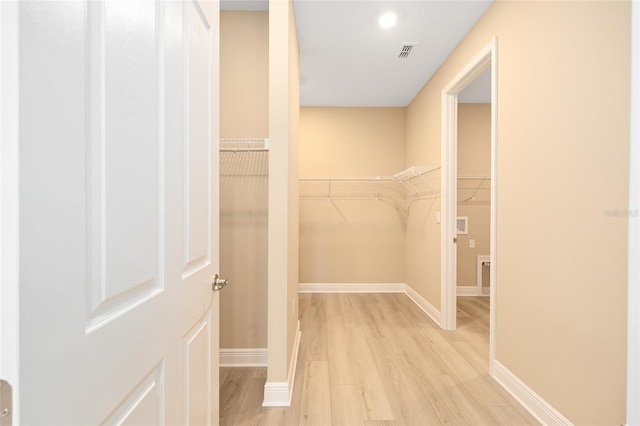 10833 SW 101st Loop, Ocala, FL 34481 - spacious closet featuring light wood-style flooring