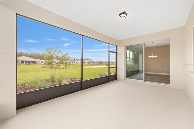 10833 SW 101st Loop, Ocala, FL 34481 - unfurnished sunroom with a chandelier