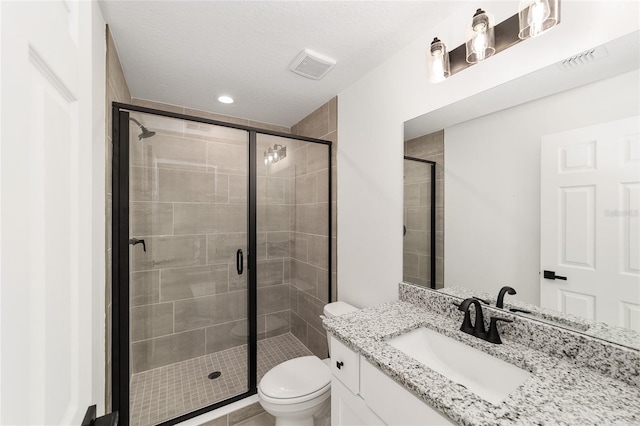 1581 SW Paradise Heights Rd, Dunnellon, FL 34431 - full bathroom with vanity, a stall shower, and a textured ceiling