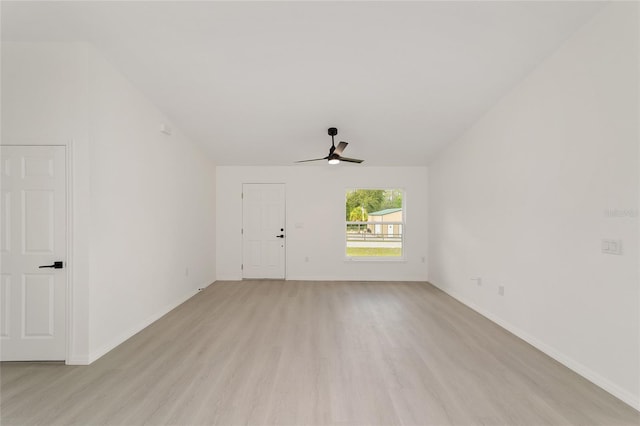 1581 SW Paradise Heights Rd, Dunnellon, FL 34431 - unfurnished living room with light wood-type flooring and ceiling fan
