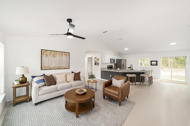 1581 SW Paradise Heights Rd, Dunnellon, FL 34431 - living area with lofted ceiling, recessed lighting, and a ceiling fan
