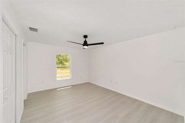 1581 SW Paradise Heights Rd, Dunnellon, FL 34431 - empty room with a ceiling fan and light wood-style flooring