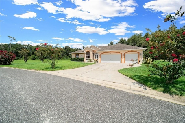 19583 SW 77th Loop, Dunnellon, FL 34432 - single story home featuring an attached garage, concrete driveway, a front lawn, and stucco siding