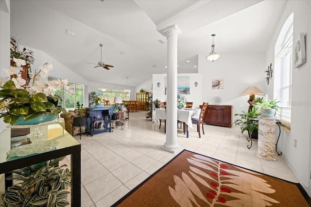 19583 SW 77th Loop, Dunnellon, FL 34432 - living room featuring decorative columns, ceiling fan, light tile patterned floors, and high vaulted ceiling
