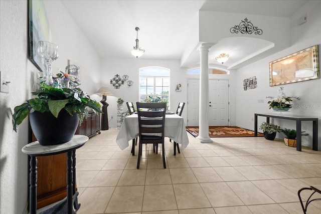 19583 SW 77th Loop, Dunnellon, FL 34432 - dining space with ornate columns and light tile patterned floors