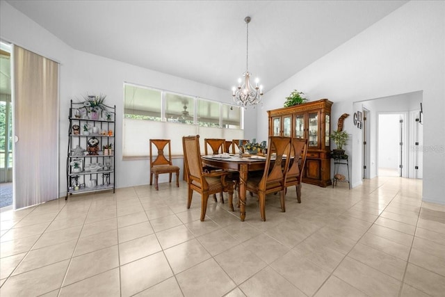 19583 SW 77th Loop, Dunnellon, FL 34432 - dining room with a chandelier, light tile patterned flooring, and vaulted ceiling