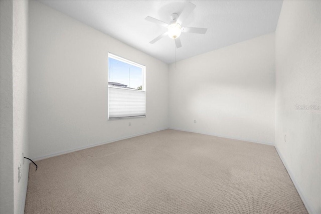 19583 SW 77th Loop, Dunnellon, FL 34432 - unfurnished room featuring ceiling fan and carpet