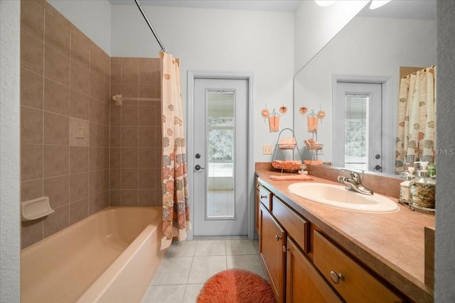 19583 SW 77th Loop, Dunnellon, FL 34432 - bathroom featuring tile patterned flooring, vanity, and shower / bath combo with shower curtain