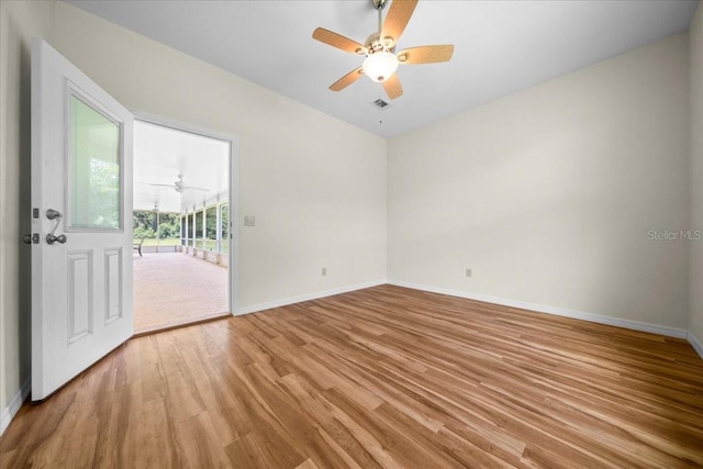 19583 SW 77th Loop, Dunnellon, FL 34432 - unfurnished room featuring light wood-type flooring and a ceiling fan