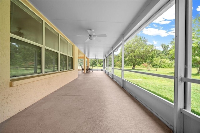 19583 SW 77th Loop, Dunnellon, FL 34432 - unfurnished sunroom with a ceiling fan