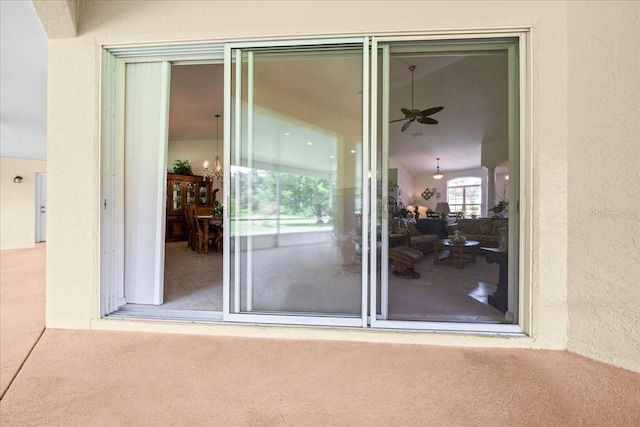 19583 SW 77th Loop, Dunnellon, FL 34432 - doorway to property with stucco siding