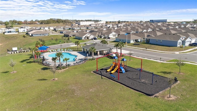 547 Tanaro Ln, Haines City, FL 33844 - aerial perspective of suburban area featuring a pool area