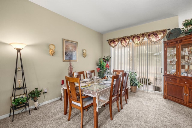 2587 W Angola Dr, Beverly Hills, FL 34465 - dining area featuring light carpet and baseboards