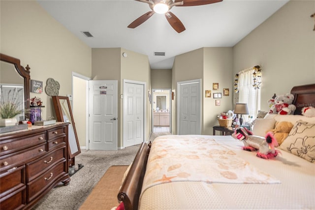 2587 W Angola Dr, Beverly Hills, FL 34465 - bedroom with carpet floors, ensuite bath, a ceiling fan, and two closets