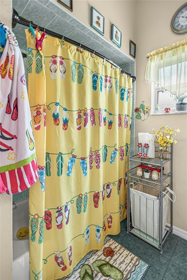 2587 W Angola Dr, Beverly Hills, FL 34465 - bathroom with a shower with shower curtain and tile patterned flooring