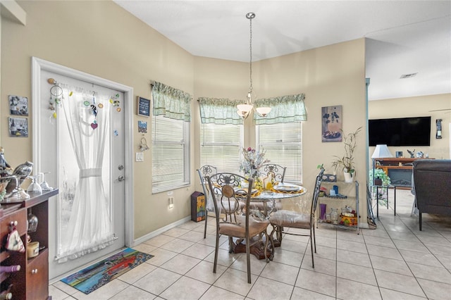 2587 W Angola Dr, Beverly Hills, FL 34465 - dining space with light tile patterned floors and baseboards