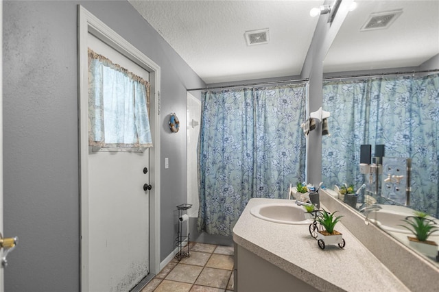 2685 W Apricot Dr, Beverly Hills, FL 34465 - bathroom with vanity and a textured ceiling
