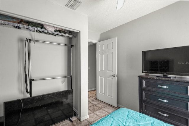 2685 W Apricot Dr, Beverly Hills, FL 34465 - bedroom with light tile patterned flooring and baseboards