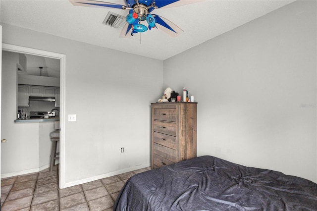 2685 W Apricot Dr, Beverly Hills, FL 34465 - bedroom featuring baseboards and a ceiling fan