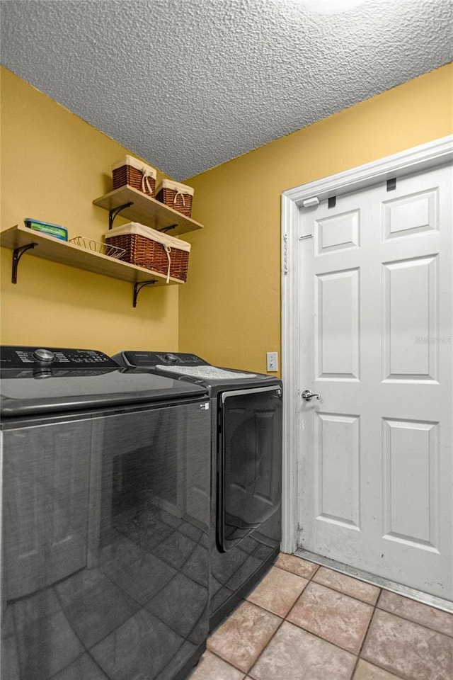 2685 W Apricot Dr, Beverly Hills, FL 34465 - laundry room with washing machine and dryer and a textured ceiling