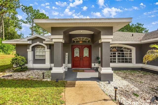 2685 W Apricot Dr, Beverly Hills, FL 34465 - entrance to property featuring stucco siding and covered porch