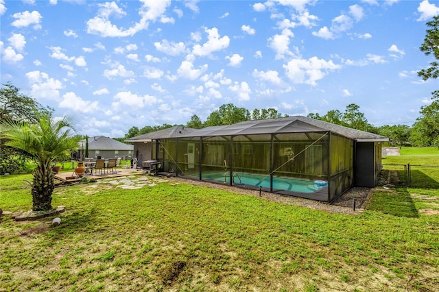 2685 W Apricot Dr, Beverly Hills, FL 34465 - rear view of house with a patio area, an outdoor pool, and a lanai