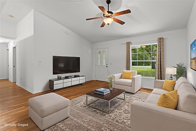 2105 E Dearborn Dr, Hernando, FL 34442 - living area with lofted ceiling, ceiling fan, and wood finished floors
