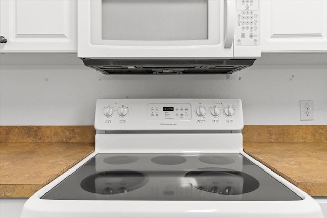 2105 E Dearborn Dr, Hernando, FL 34442 - kitchen view of white appliances and white cabinetry
