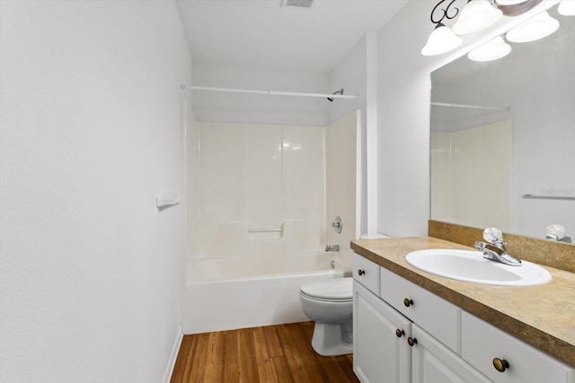 2105 E Dearborn Dr, Hernando, FL 34442 - bathroom featuring vanity, wood finished floors, and tub / shower combination