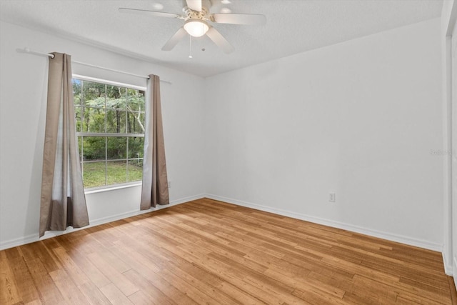 2105 E Dearborn Dr, Hernando, FL 34442 - unfurnished room featuring light wood finished floors and a ceiling fan