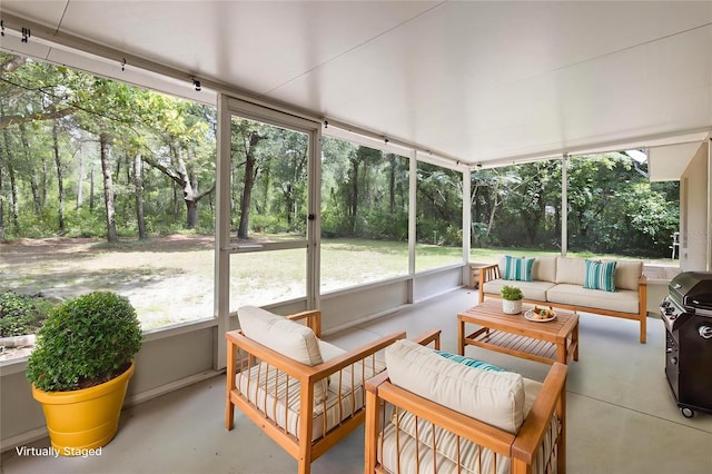 2105 E Dearborn Dr, Hernando, FL 34442 - sunroom featuring outdoor lounge area and view of wooded area