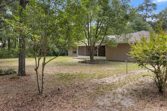 2105 E Dearborn Dr, Hernando, FL 34442 - view of grassy yard with a sunroom